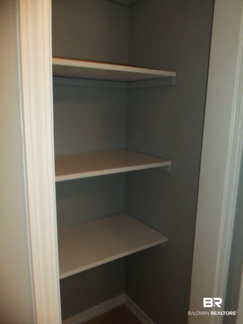 18568 South Greeno Road Fairhope, AL 36532 - Photo 11 of 22 EXTRA STORAGE IN LARGE LINEN CLOSET IN BATH 2.