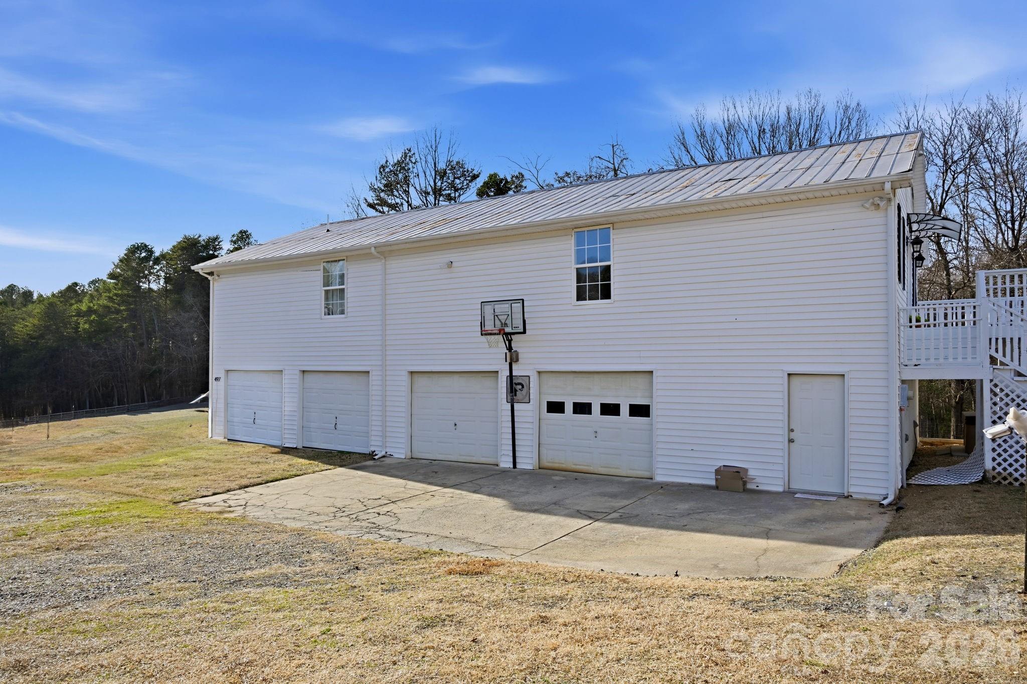 495 Chalk Maple Road China Grove, NC 28023 - Photo 12 of 48 a view of a house with a yard