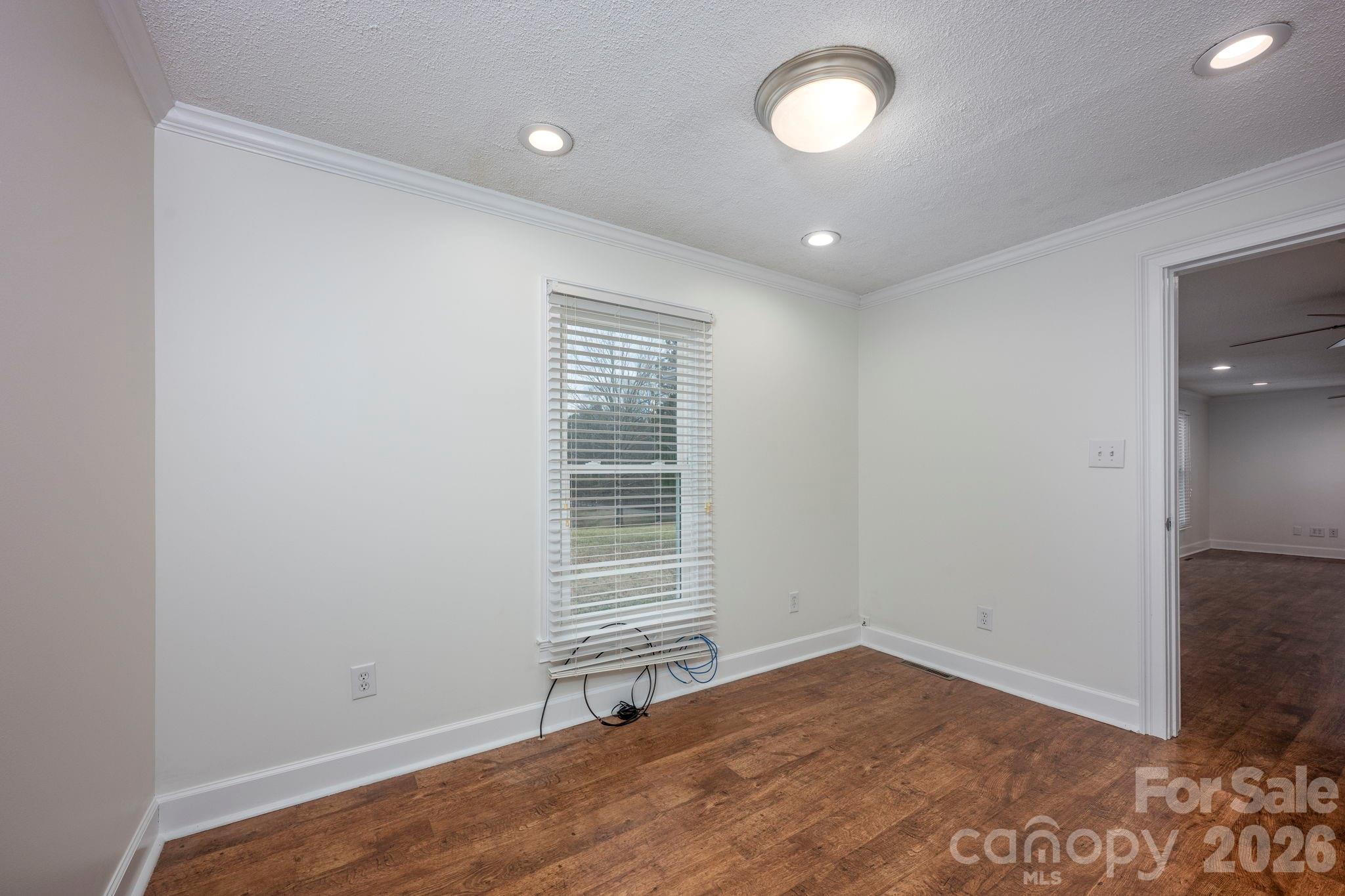 495 Chalk Maple Road China Grove, NC 28023 - Photo 31 of 48 wooden floor in an empty room with a window