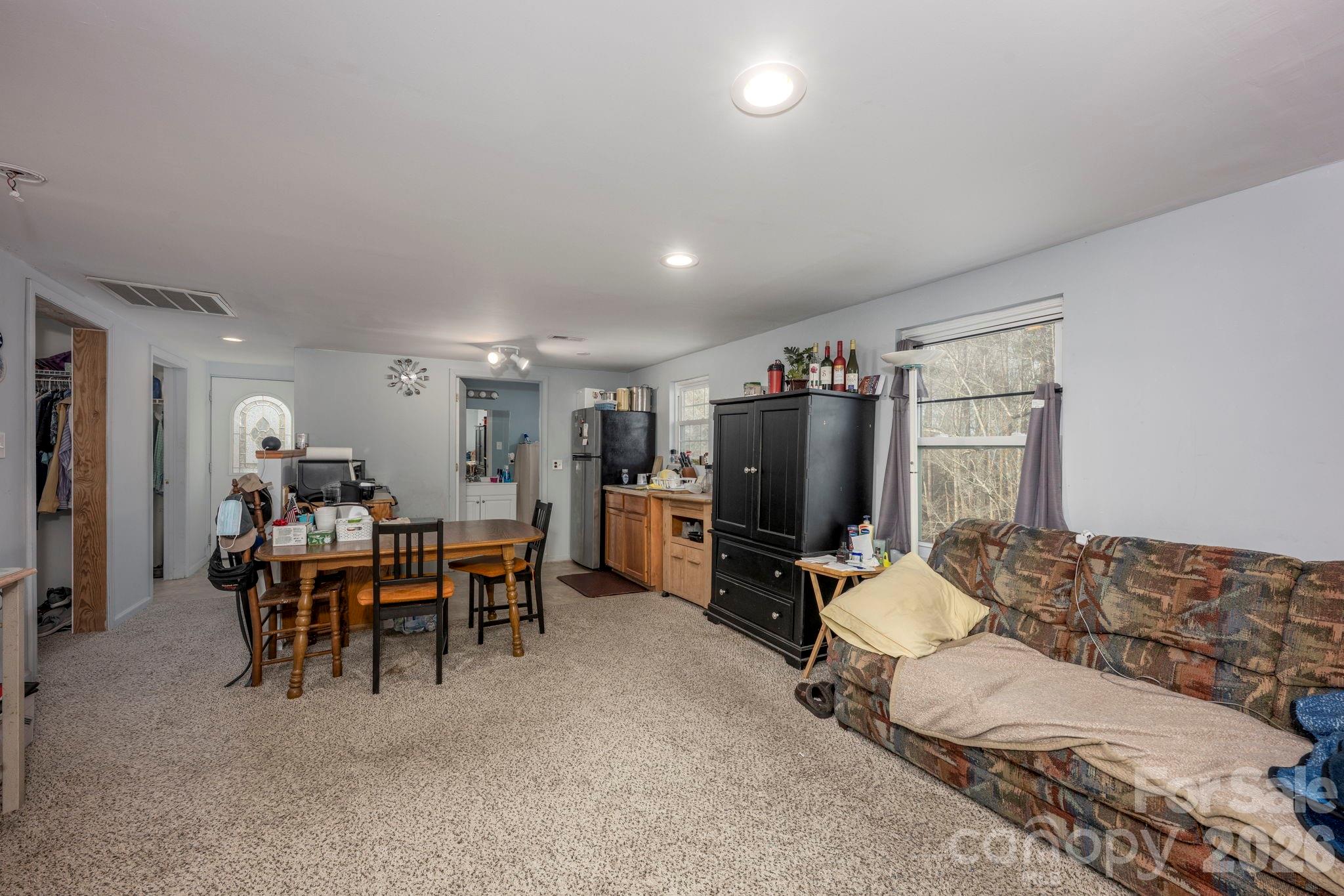 495 Chalk Maple Road China Grove, NC 28023 - Photo 43 of 48 a living room with furniture and a flat screen tv