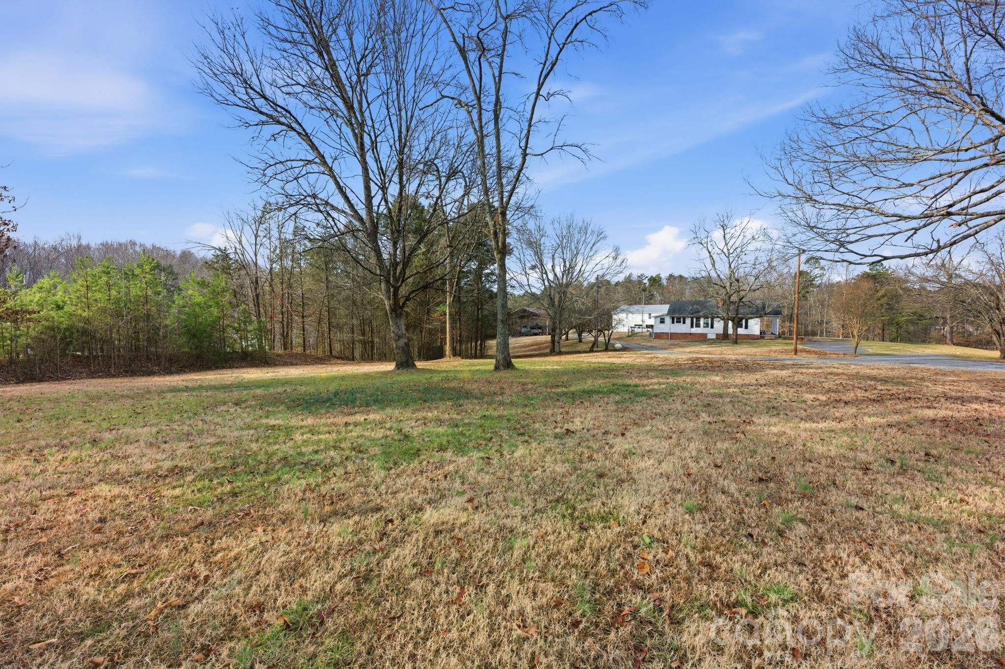495 Chalk Maple Road China Grove, NC 28023 - Photo 7 of 48 a view of a field with trees