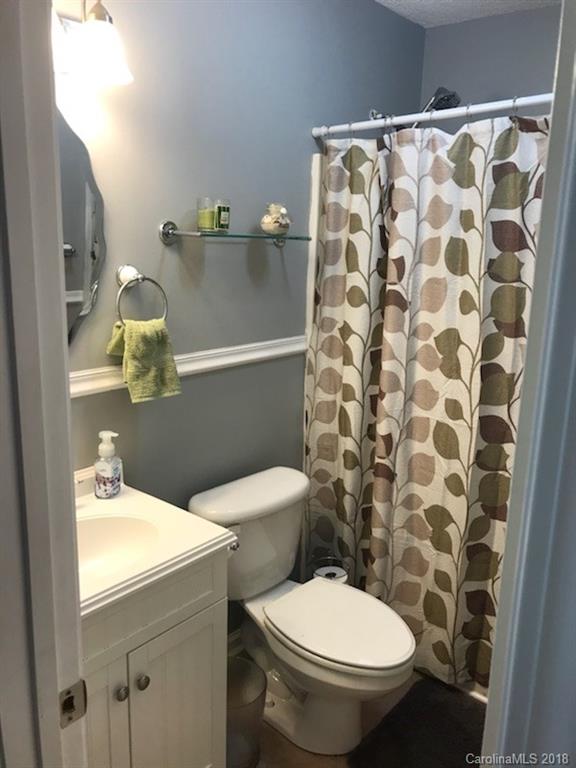 4741 Kemp Dellinger Road Maiden, NC 28650 - Photo 11 of 21 a white toilet sitting next to a bathroom sink
