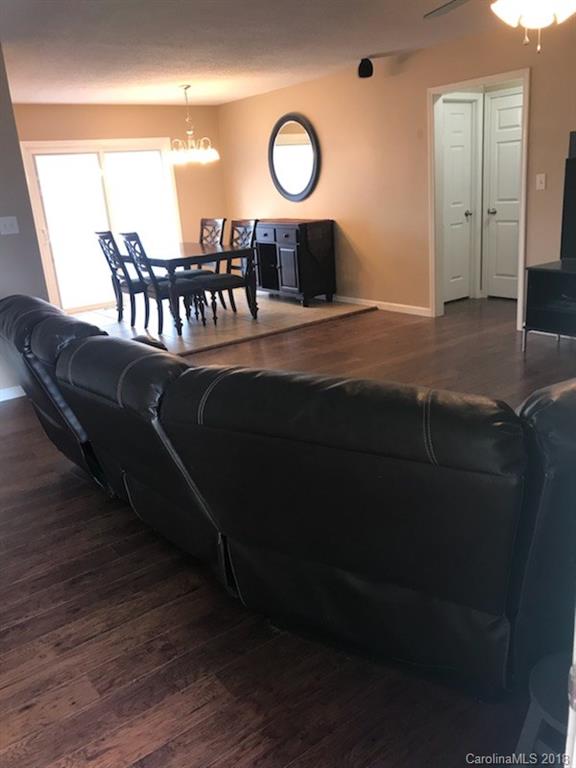 4741 Kemp Dellinger Road Maiden, NC 28650 - Photo 3 of 21 a living room with chairs wooden floor and a table