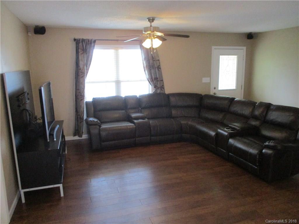 4741 Kemp Dellinger Road Maiden, NC 28650 - Photo 4 of 21 a living room with furniture window and a flat screen tv