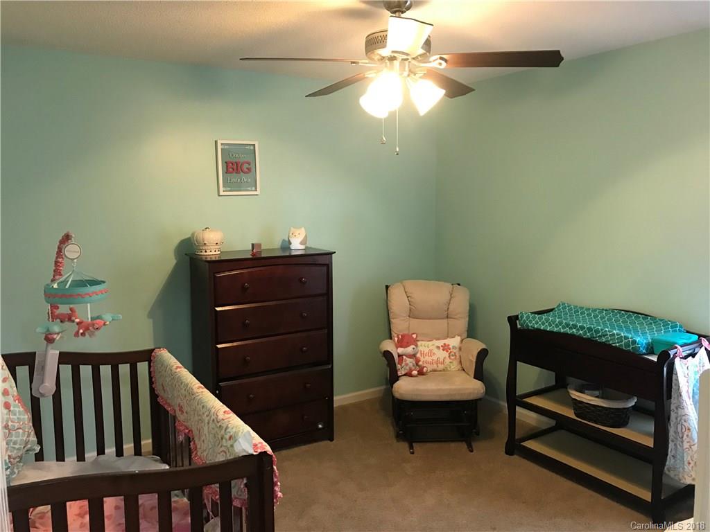 4741 Kemp Dellinger Road Maiden, NC 28650 - Photo 8 of 21 a bedroom with a bed and furniture