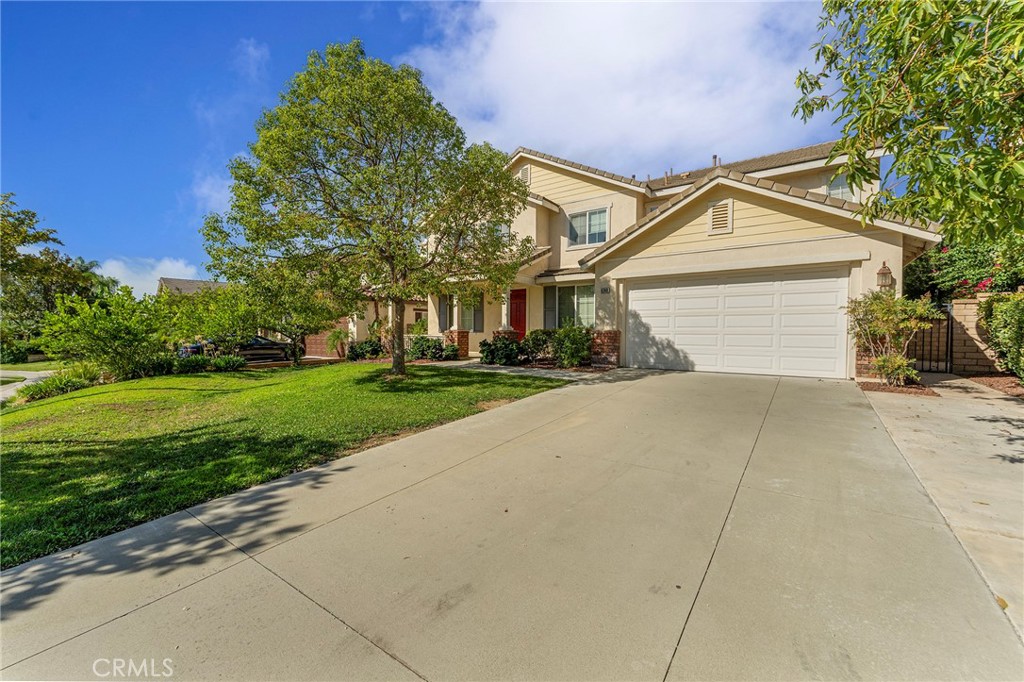 6360 Day Lily Court Rancho Cucamonga, CA 91737 - Photo 2 of 56 a view of house with yard