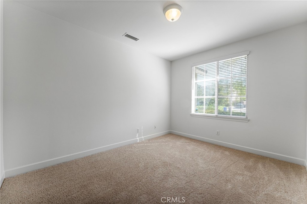 6360 Day Lily Court Rancho Cucamonga, CA 91737 - Photo 24 of 56 an empty room with windows