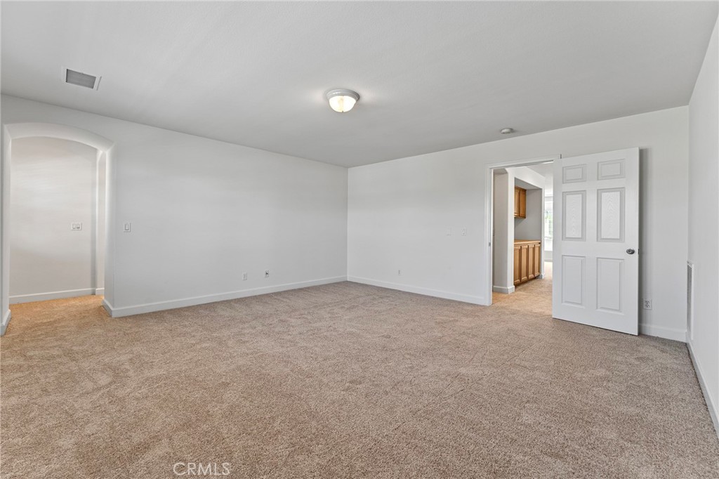 6360 Day Lily Court Rancho Cucamonga, CA 91737 - Photo 32 of 56 a view of an empty room and closet area