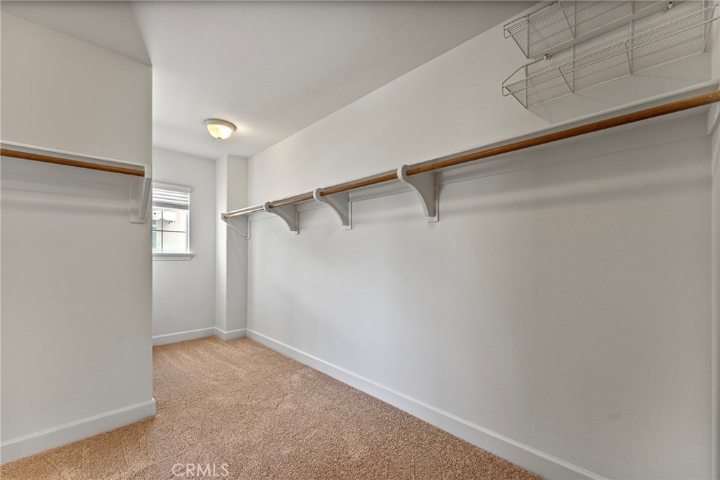 6360 Day Lily Court Rancho Cucamonga, CA 91737 - Photo 36 of 56 a view of an empty walk in closet