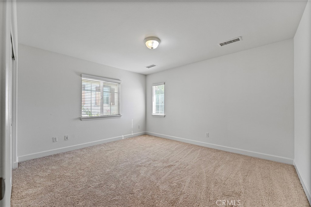 6360 Day Lily Court Rancho Cucamonga, CA 91737 - Photo 38 of 56 an empty room with windows