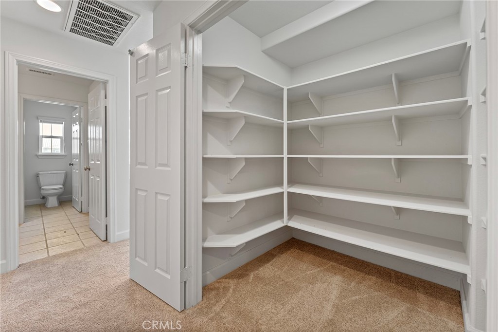 6360 Day Lily Court Rancho Cucamonga, CA 91737 - Photo 46 of 56 a view of an empty room and a bathroom