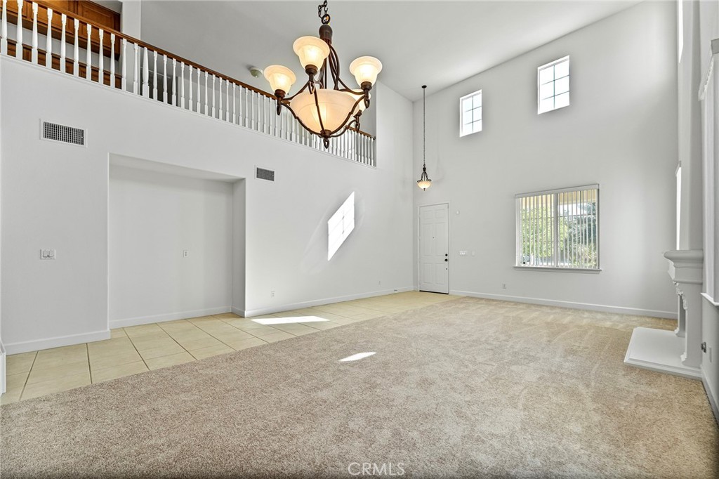 6360 Day Lily Court Rancho Cucamonga, CA 91737 - Photo 8 of 56 a view of an empty room with a window
