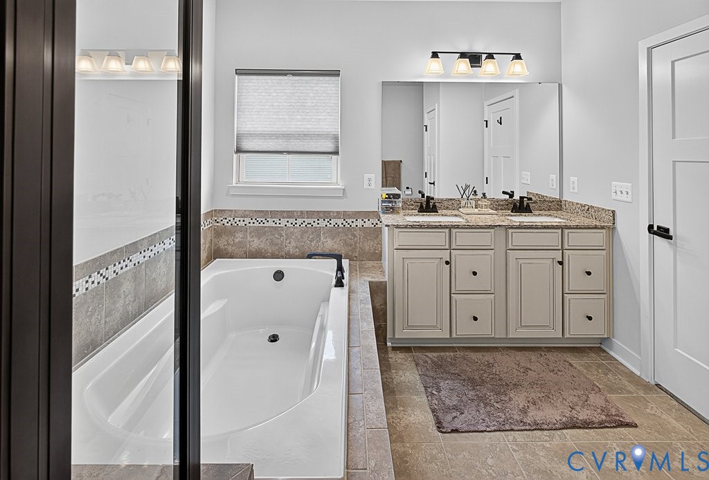 17976 Spotted Oak Road Dumfries, VA 22026 - Photo 39 of 52 Bathroom featuring a built-in soaking tub with til