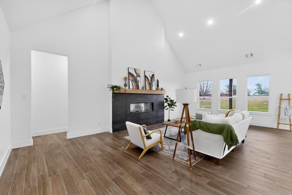 9100 County Road 669 Blue Ridge, TX 75424 - Photo 17 of 40 a living room with furniture and a wooden floor