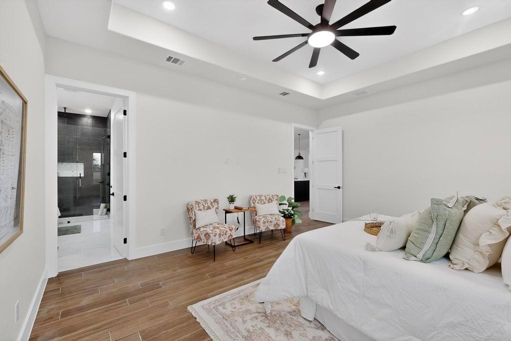 9100 County Road 669 Blue Ridge, TX 75424 - Photo 18 of 40 a bedroom with a bed and glass door