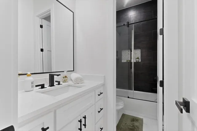 a work room with furniture and a window