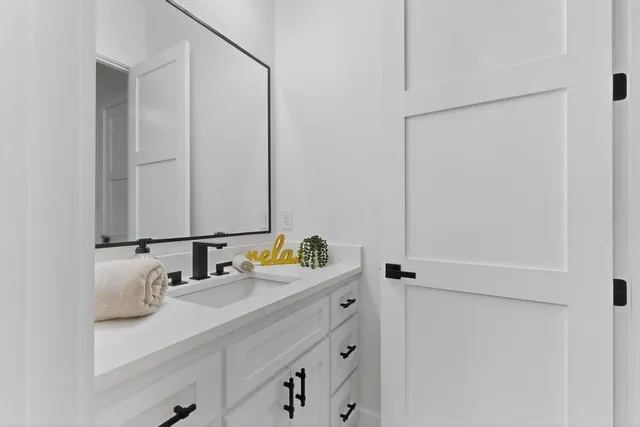 a bathroom with a shower and toilet