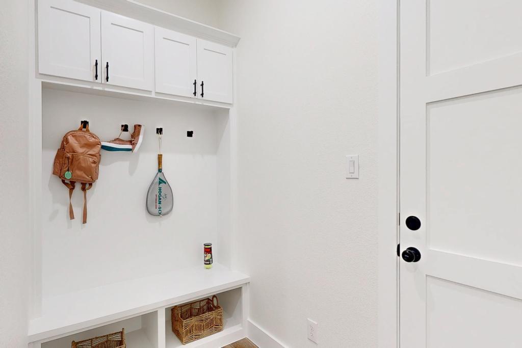 9100 County Road 669 Blue Ridge, TX 75424 - Photo 29 of 40 a bathroom with a shower and mirror