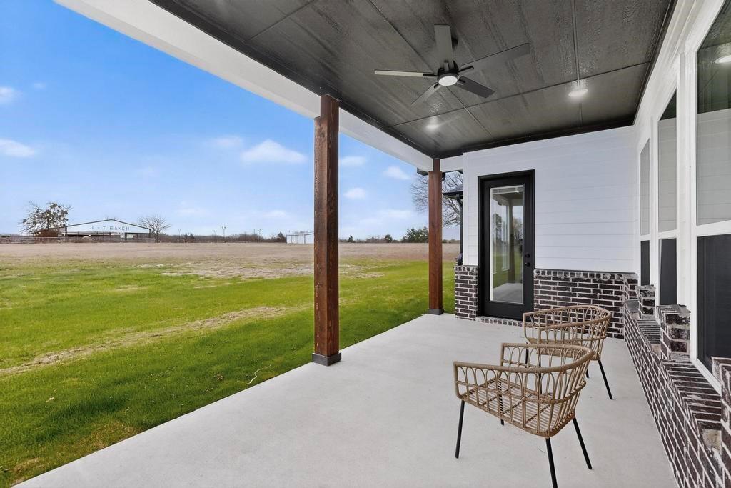 9100 County Road 669 Blue Ridge, TX 75424 - Photo 37 of 40 a view of a porch with furniture and garden