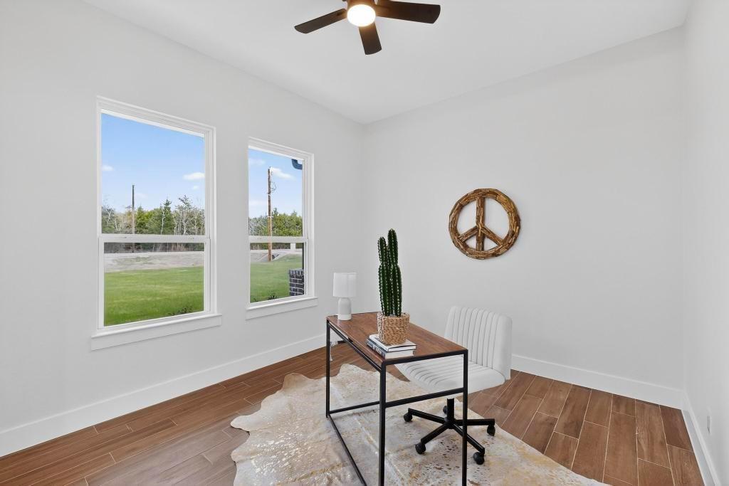 9100 County Road 669 Blue Ridge, TX 75424 - Photo 10 of 40 a living room with furniture and a window