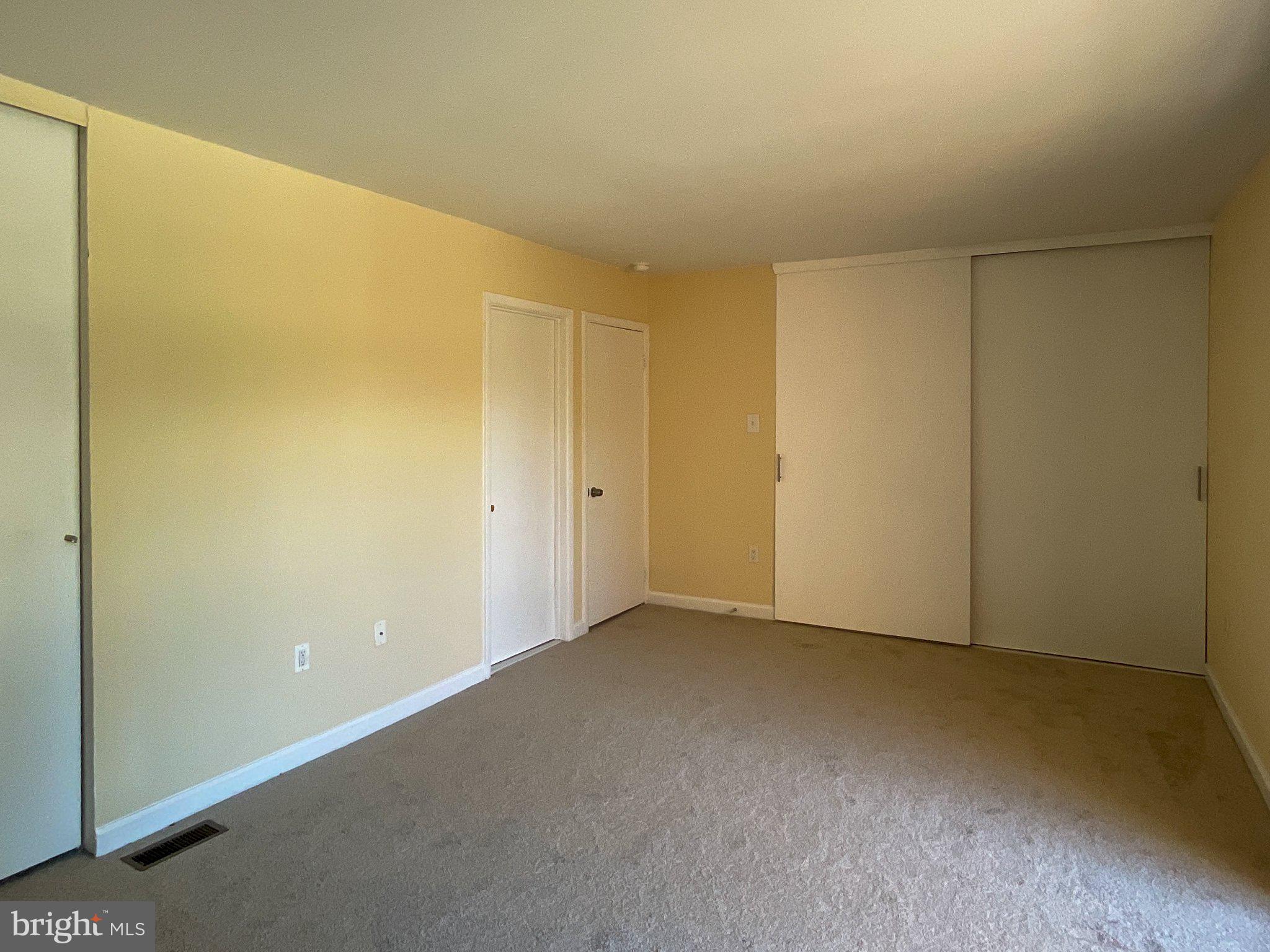 9040 Centerway Road Gaithersburg, MD 20879 - Photo 25 of 45 Spacious room with soft, neutral tones.