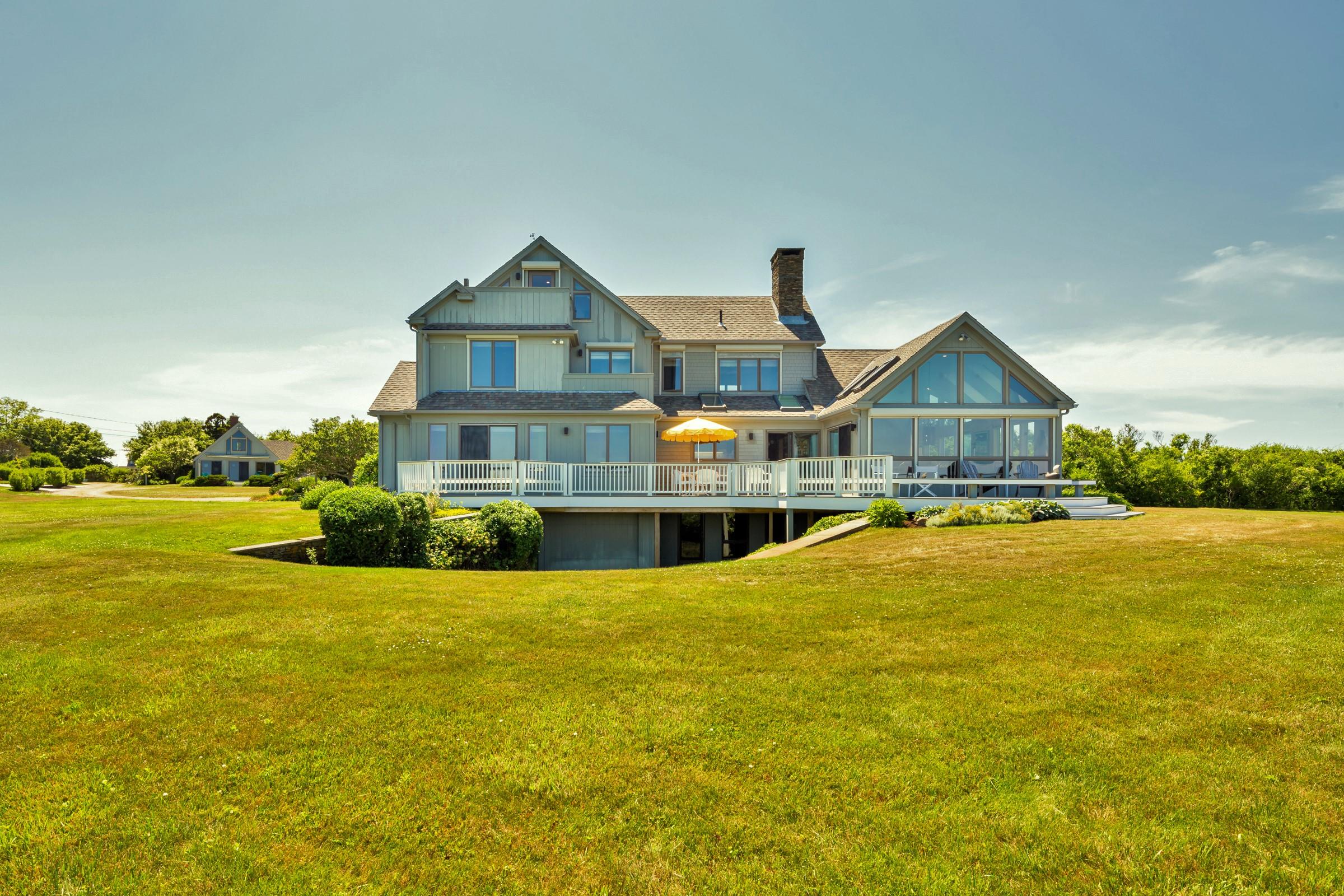 2-7 Skunk Bluff Orleans, MA 02653 - Photo 15 of 80 a front view of house with an outdoor space and balcony