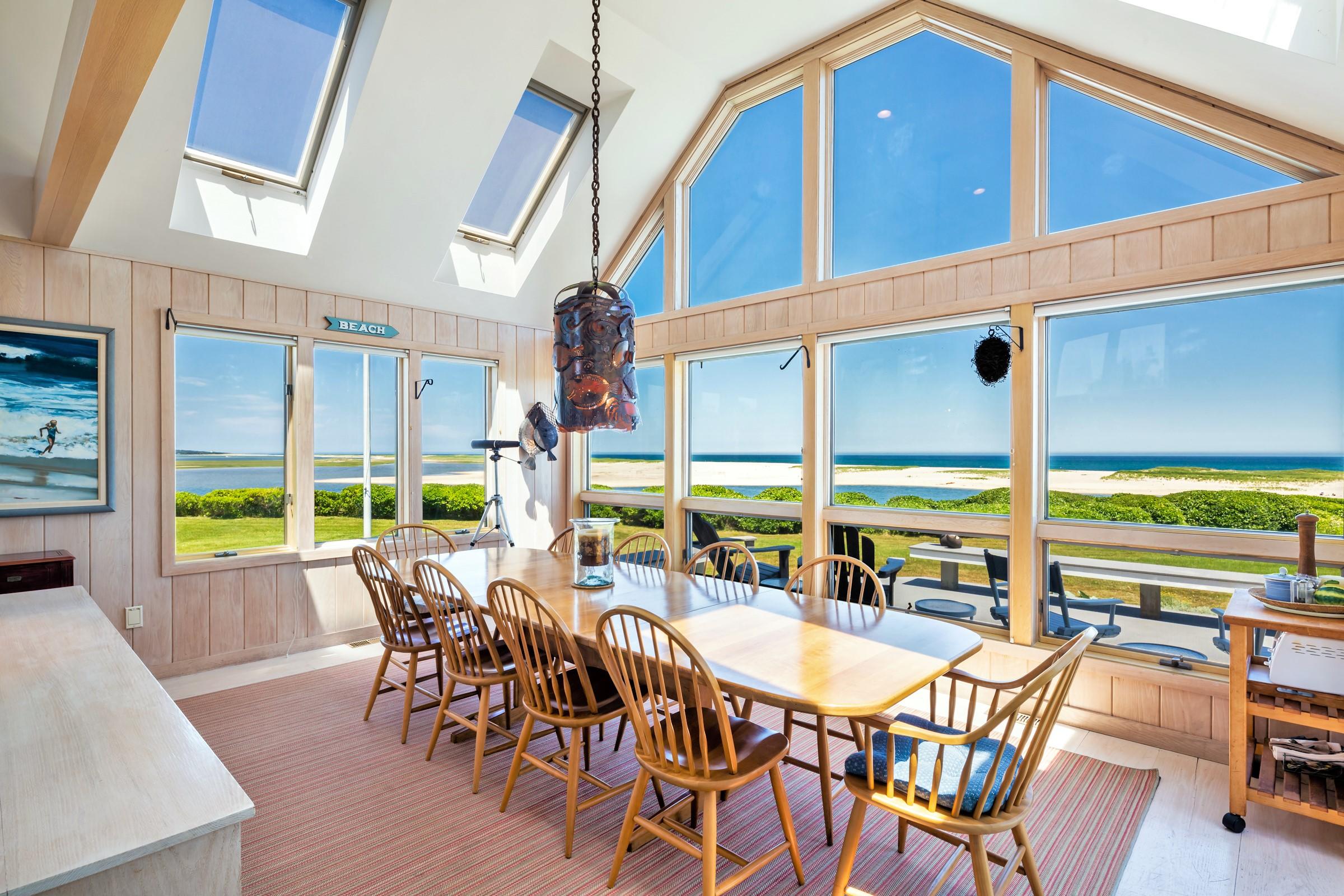 2-7 Skunk Bluff Orleans, MA 02653 - Photo 18 of 80 a view of a dining room with furniture window and outside view