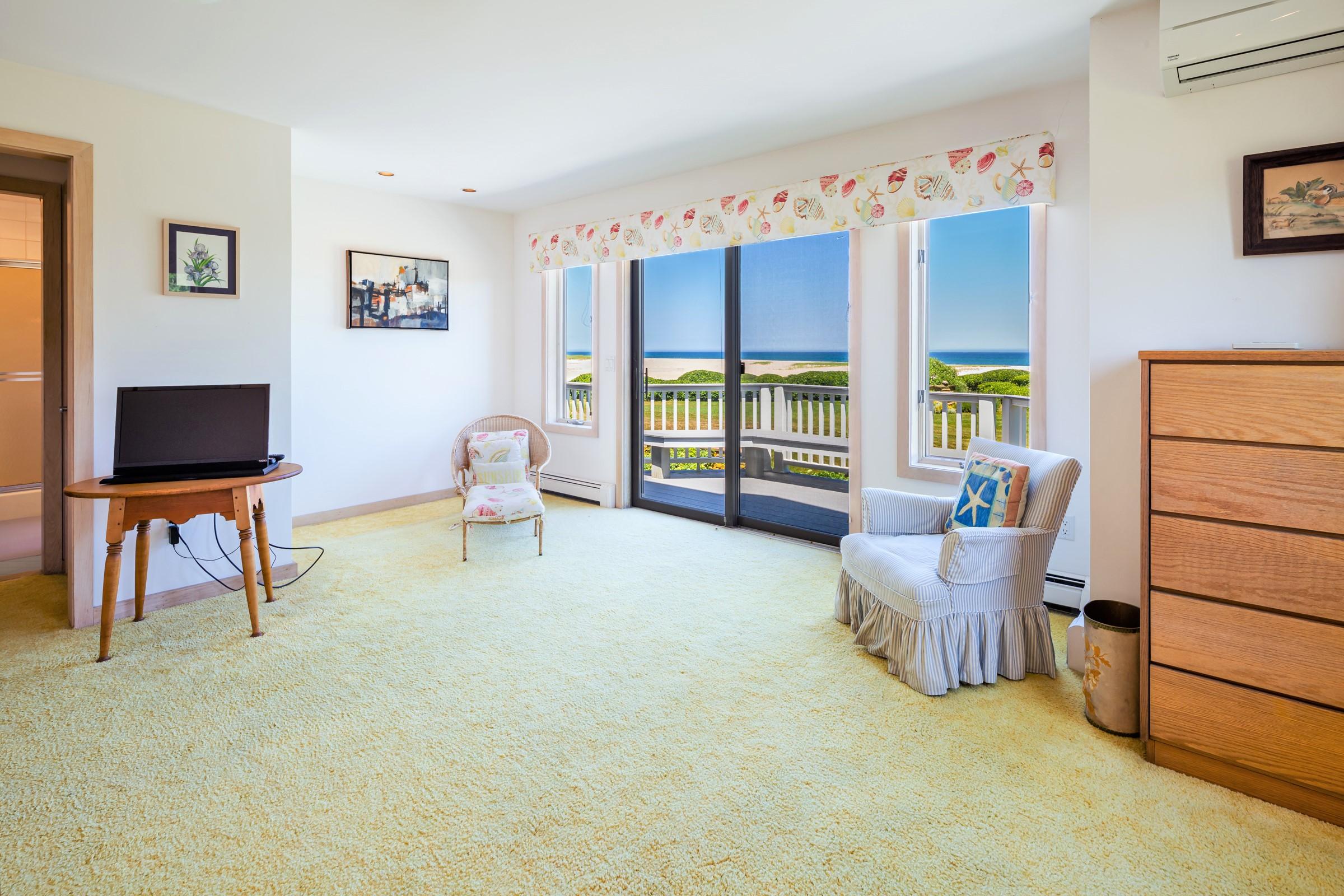 2-7 Skunk Bluff Orleans, MA 02653 - Photo 32 of 80 a bedroom with furniture and a window