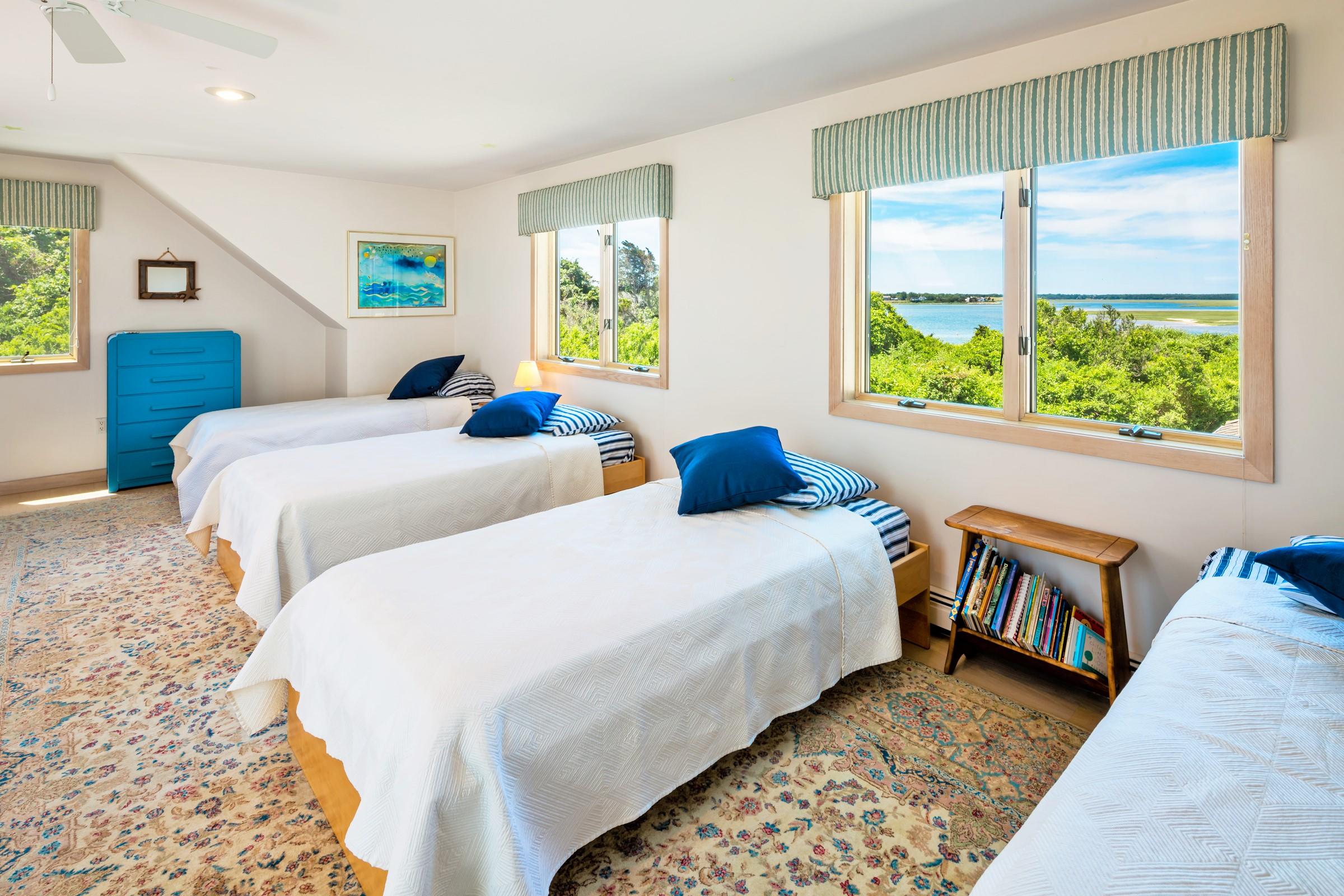 2-7 Skunk Bluff Orleans, MA 02653 - Photo 38 of 80 a bedroom with two beds and a window