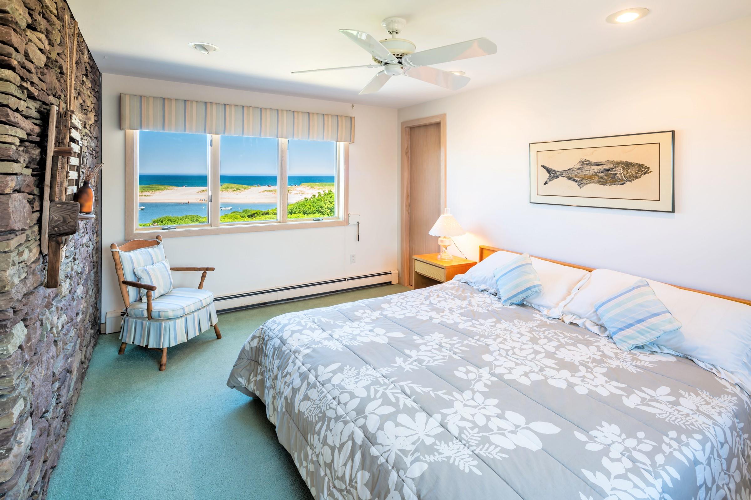 2-7 Skunk Bluff Orleans, MA 02653 - Photo 43 of 80 a bedroom with a bed and a window