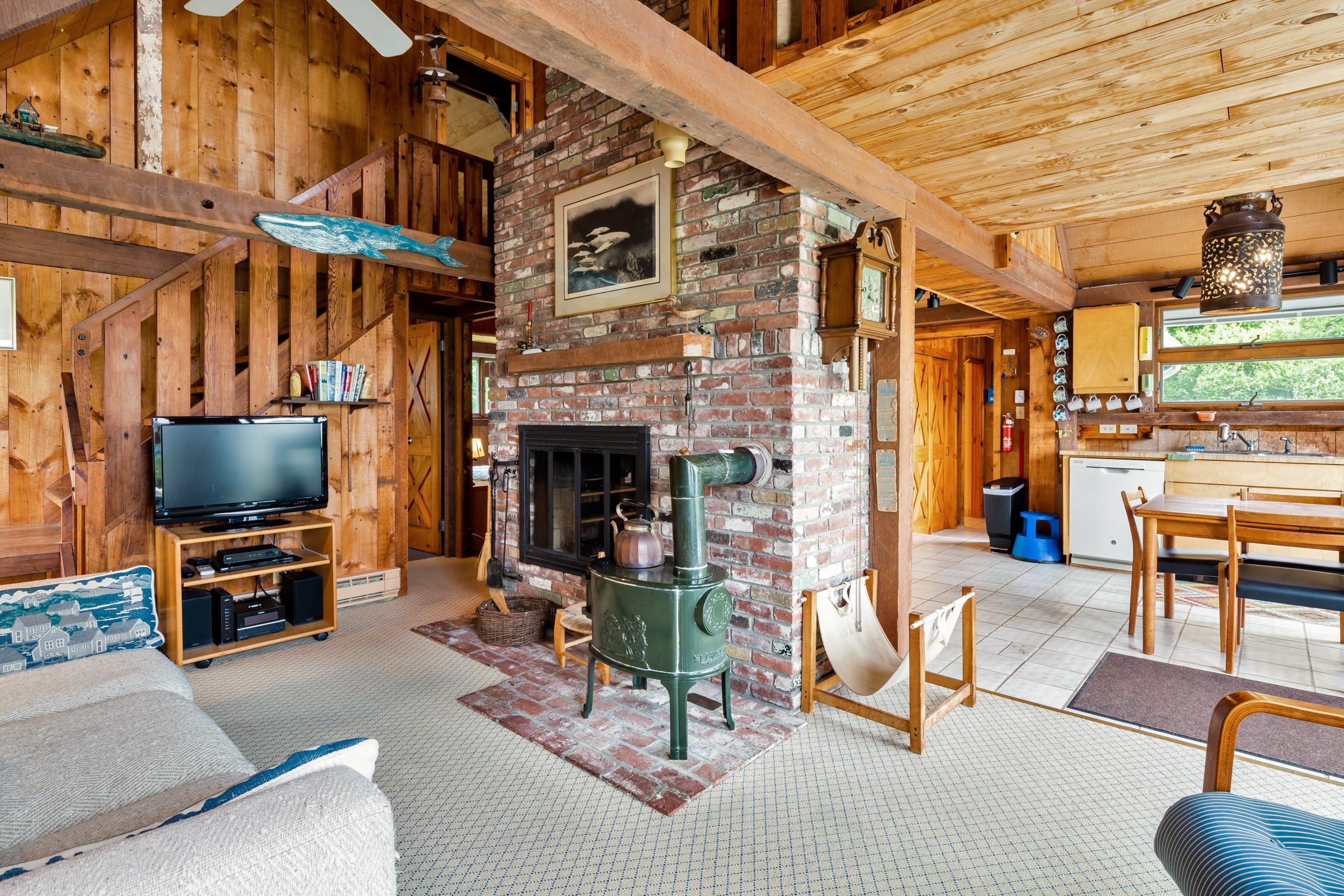 2-7 Skunk Bluff Orleans, MA 02653 - Photo 63 of 80 a view of a livingroom with furniture and a flat screen tv