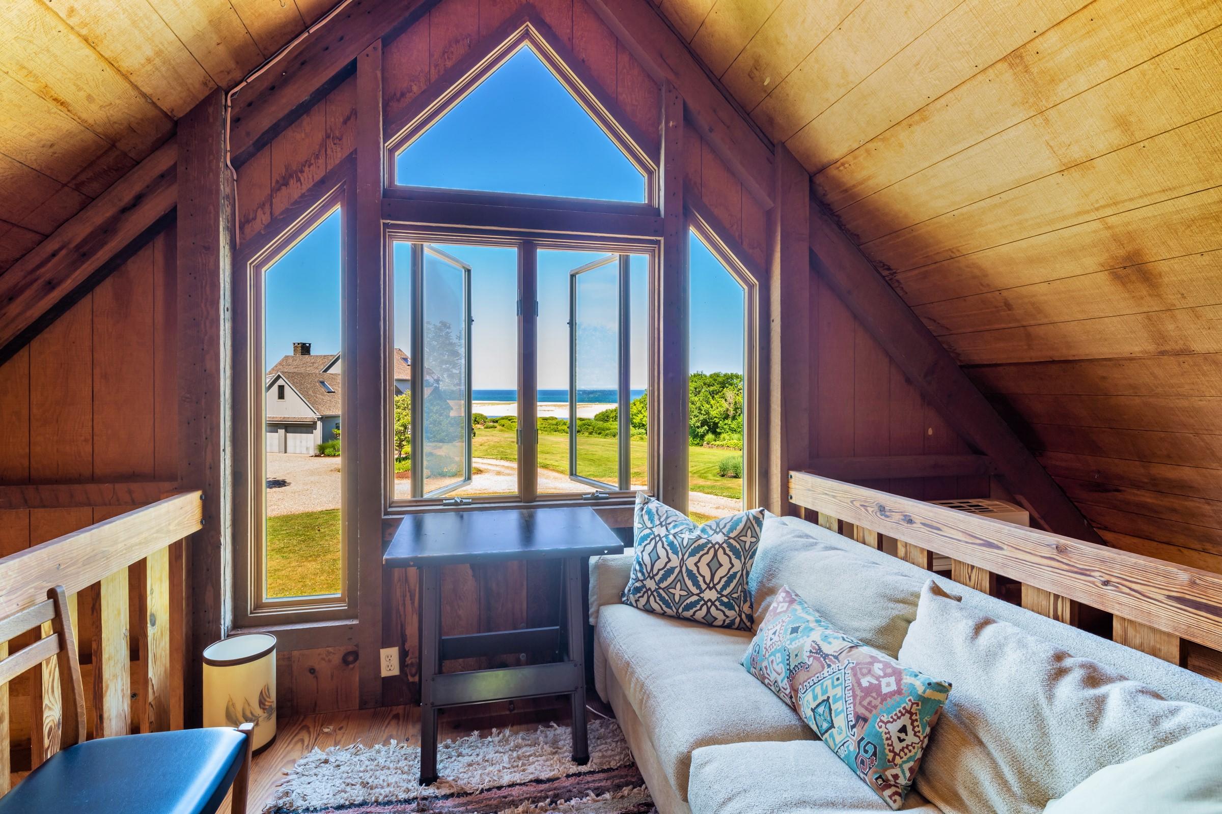 2-7 Skunk Bluff Orleans, MA 02653 - Photo 66 of 80 a living room with furniture and a window