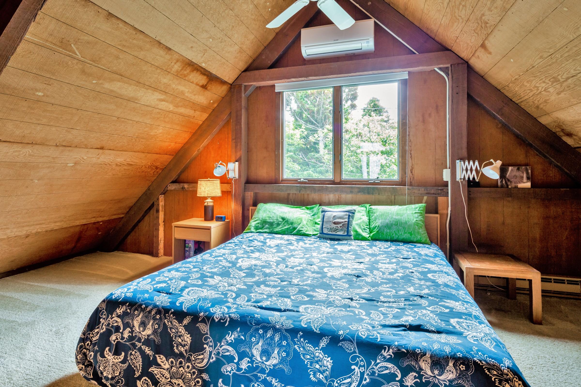 2-7 Skunk Bluff Orleans, MA 02653 - Photo 67 of 80 a bed sitting in a bedroom next to a window