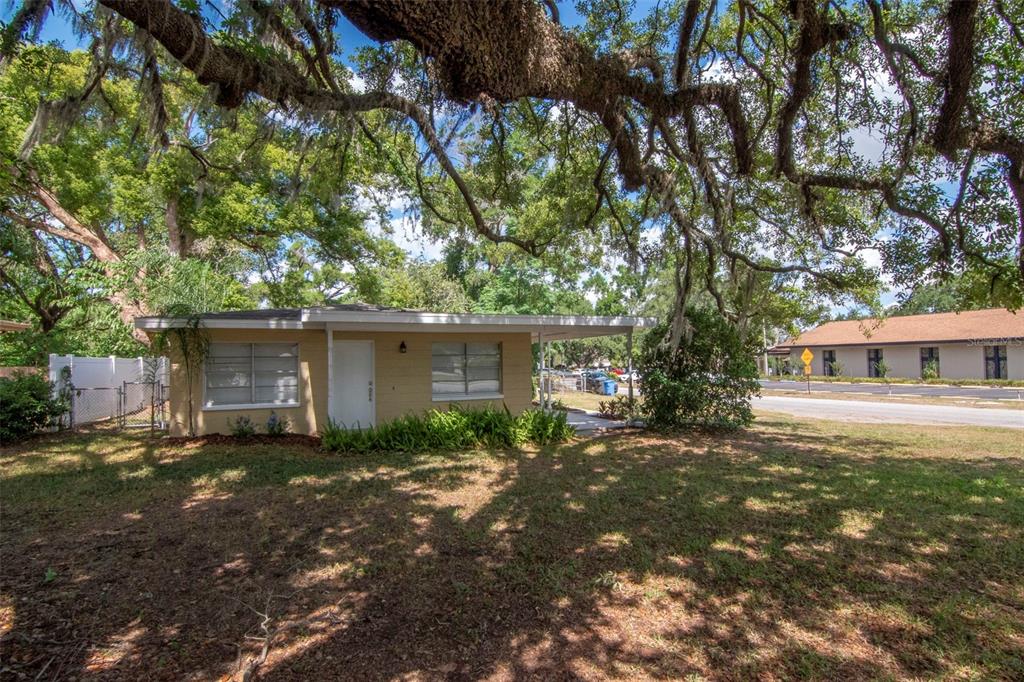 126 Kingsway Road Brandon, FL 33510 - Photo 42 of 42 a view of a house with a yard