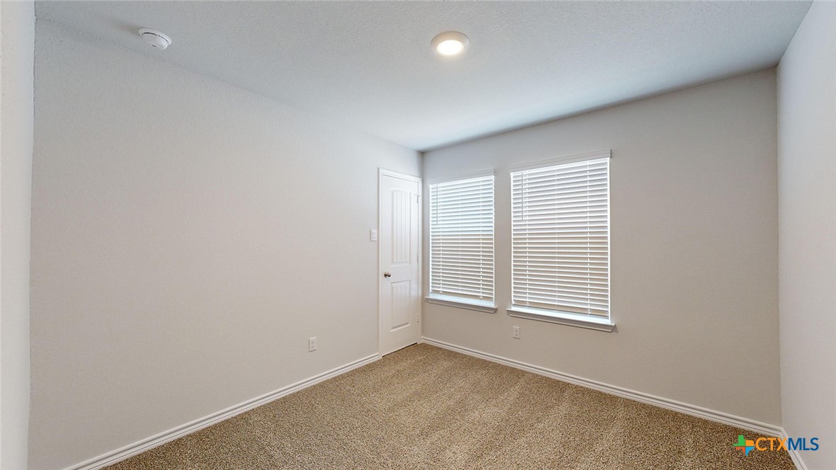 2136 Buckner Street Nolanville, TX 76559 - Photo 24 of 33 an empty room with windows