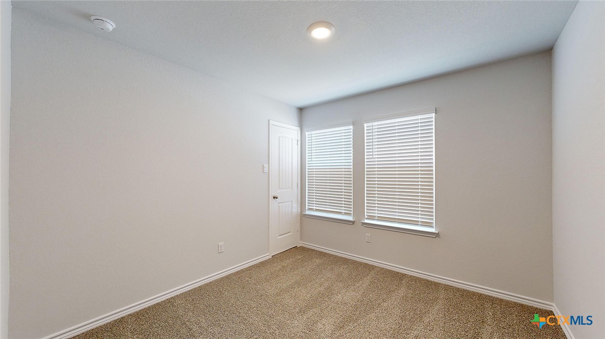 2136 Buckner Street Nolanville, TX 76559 - Photo 30 of 33 an empty room with windows