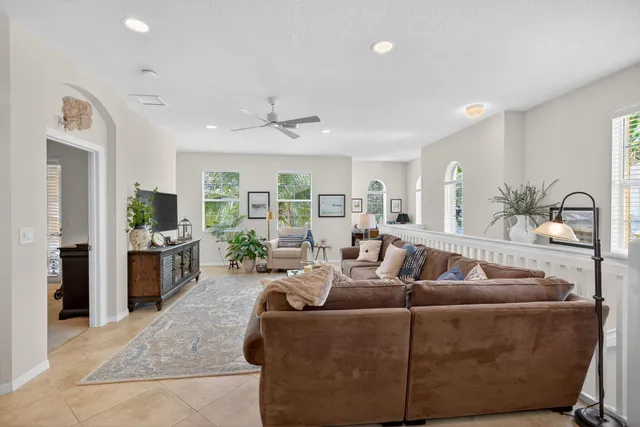 a living room with furniture or couch and a flat screen tv