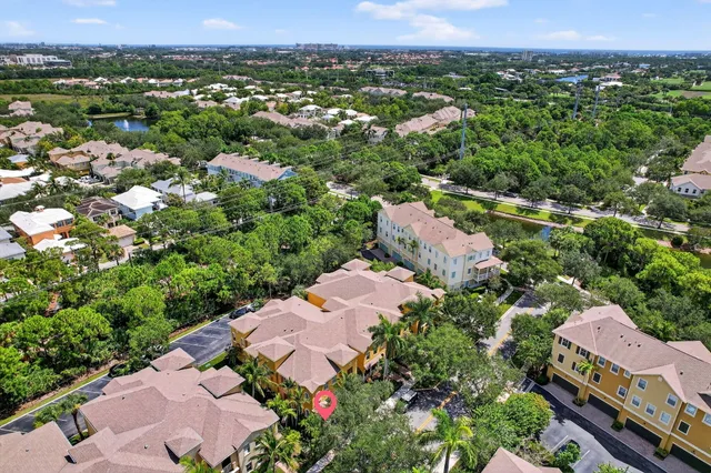 an aerial view of a house with a garden