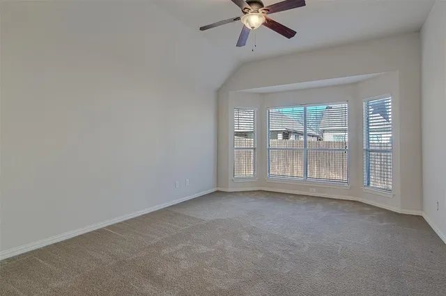 a bedroom with a bed and furniture