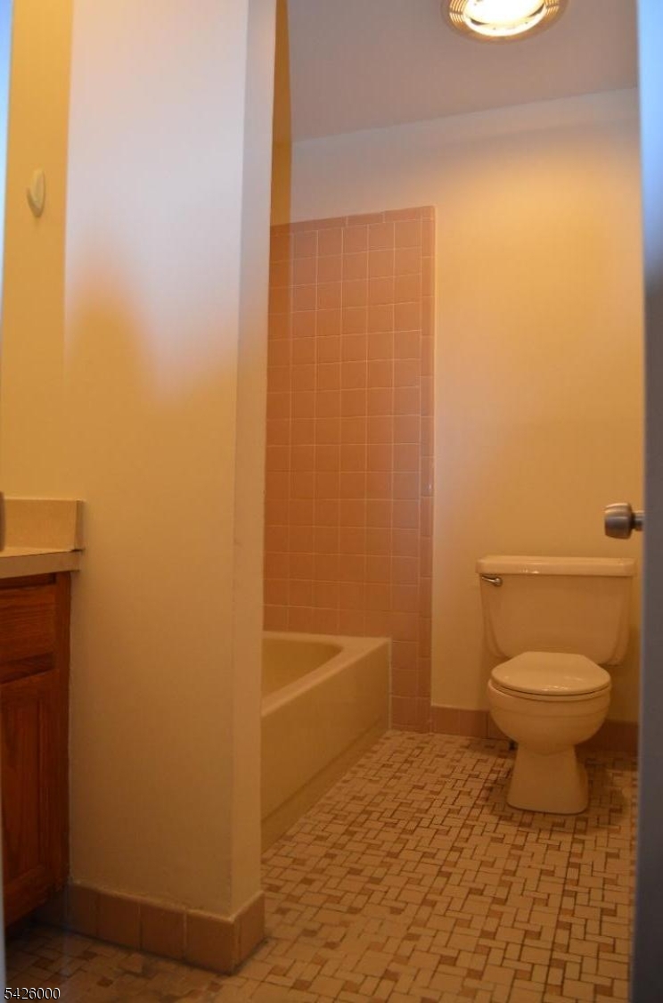 50 Cook Avenue, Unit 1A Madison, NJ 07940 - Photo 12 of 13 a bathroom with a toilet and a shower