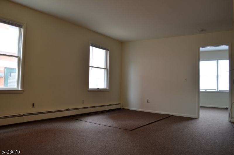 50 Cook Avenue, Unit 1A Madison, NJ 07940 - Photo 3 of 13 an empty room with a window