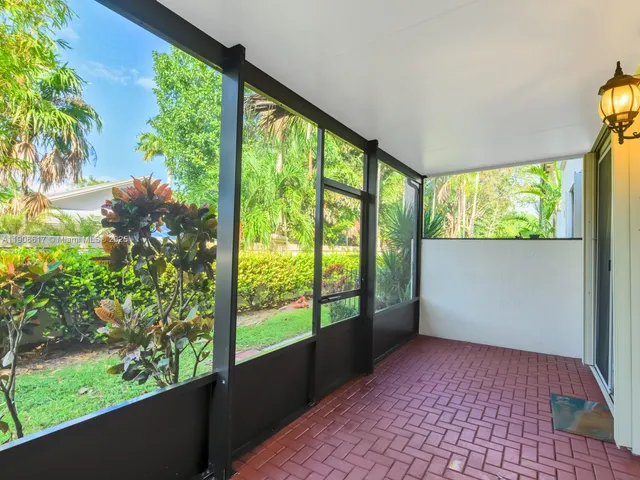 a view of a house with swimming pool