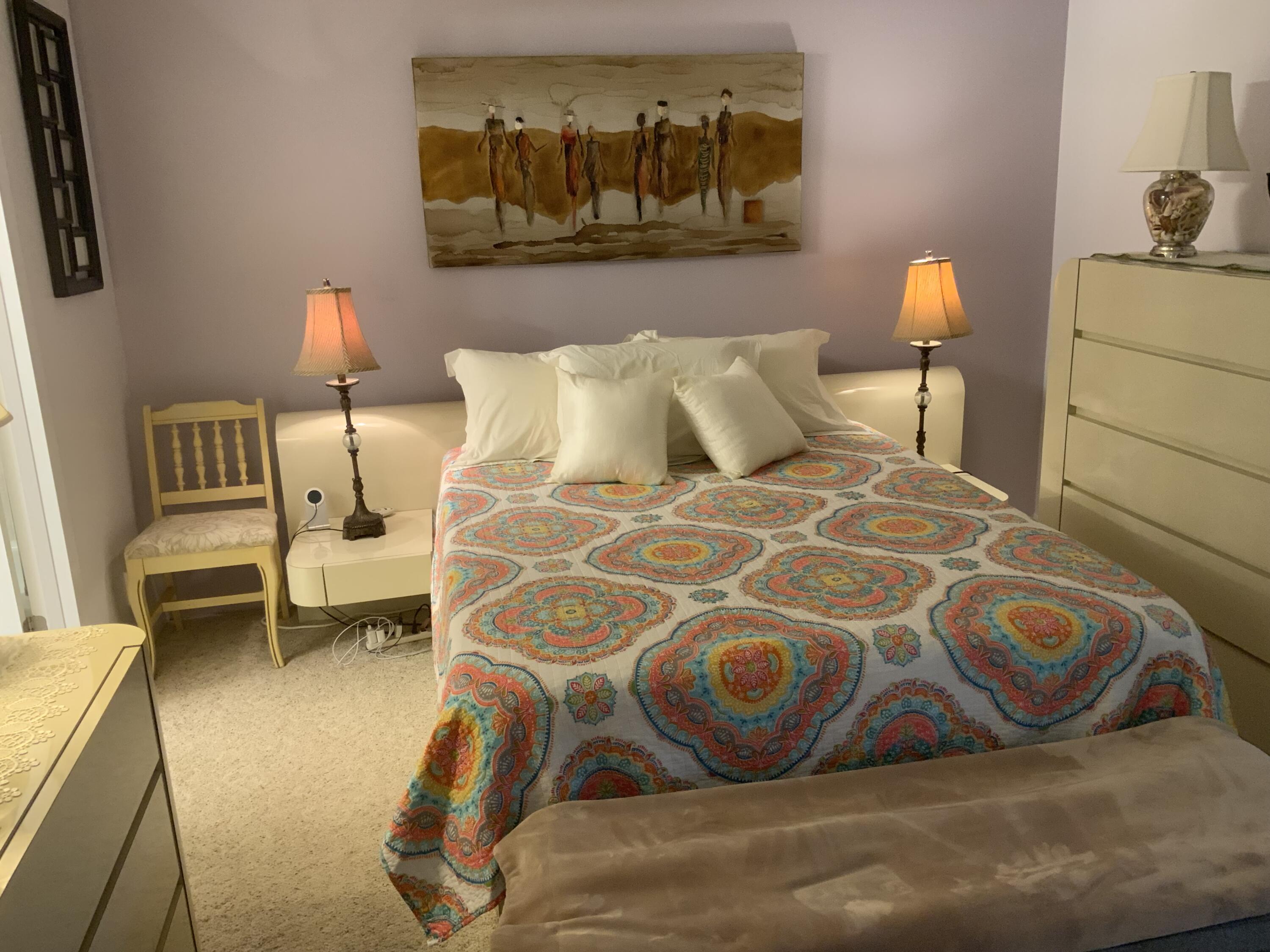 353 Dorset I Boca Raton, FL 33434 - Photo 25 of 30 a bedroom with a bed and wooden floor