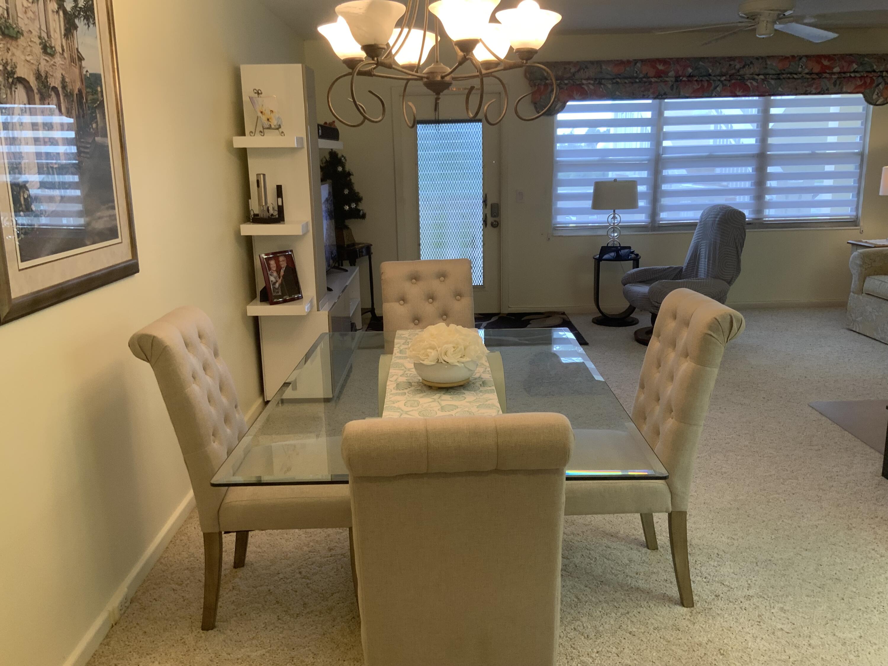 353 Dorset I Boca Raton, FL 33434 - Photo 9 of 30 a dining room with furniture and a window