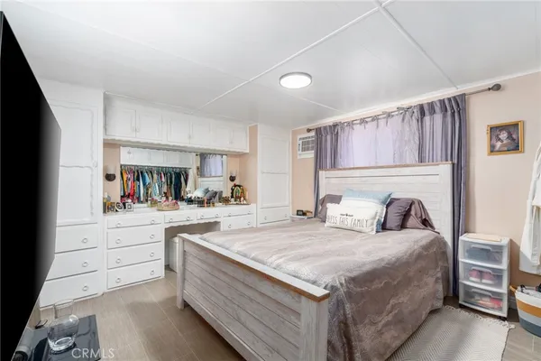 a large white bed in a white room