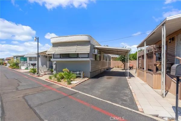 a view of a house with a street