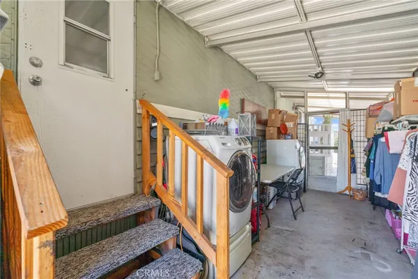 a view of a hallway with closet