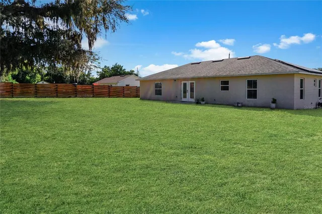 a house view with a garden space