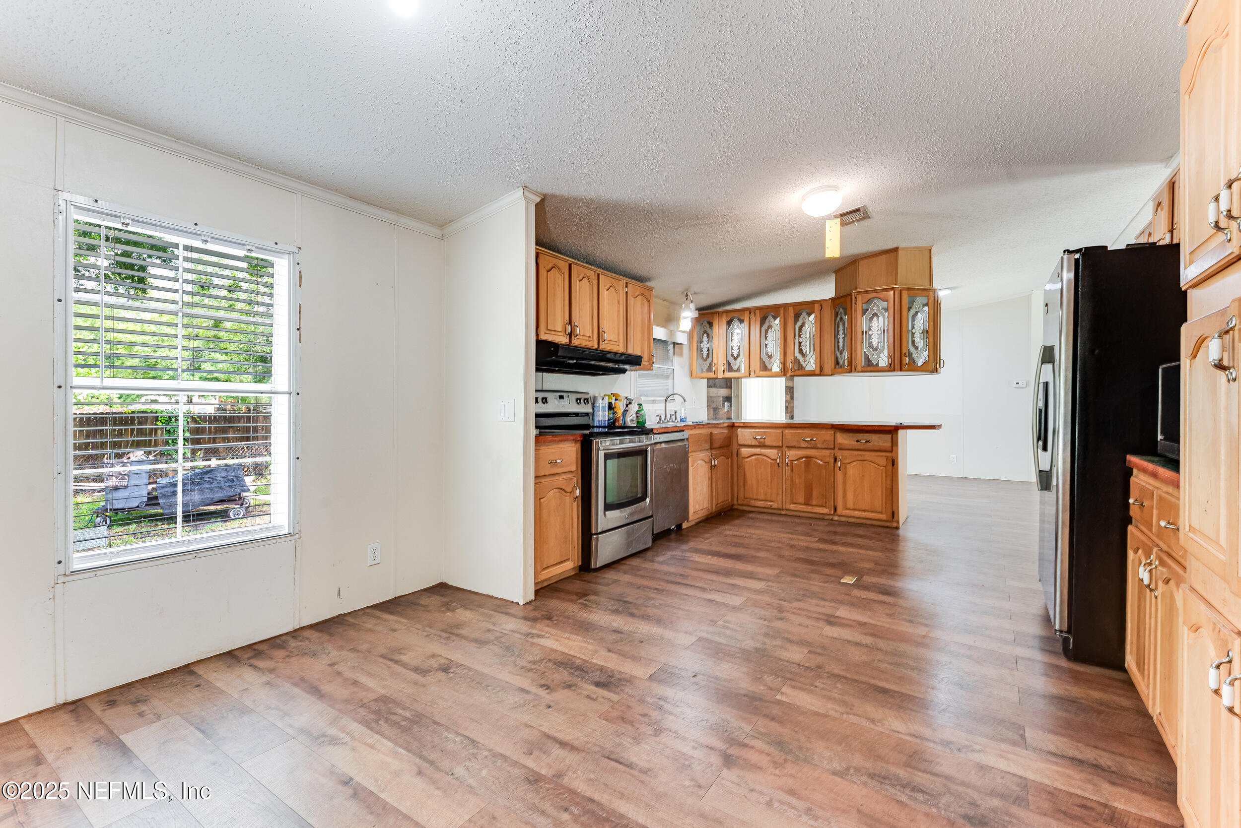 8878 Orme Road Jacksonville, FL 32220 - Photo 5 of 20 Breakfast Area & Kitchen