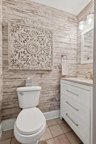 a bathroom with a toilet and a sink